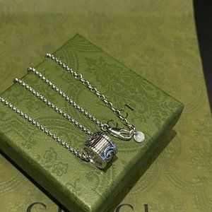 Gucci do old transport ring necklace